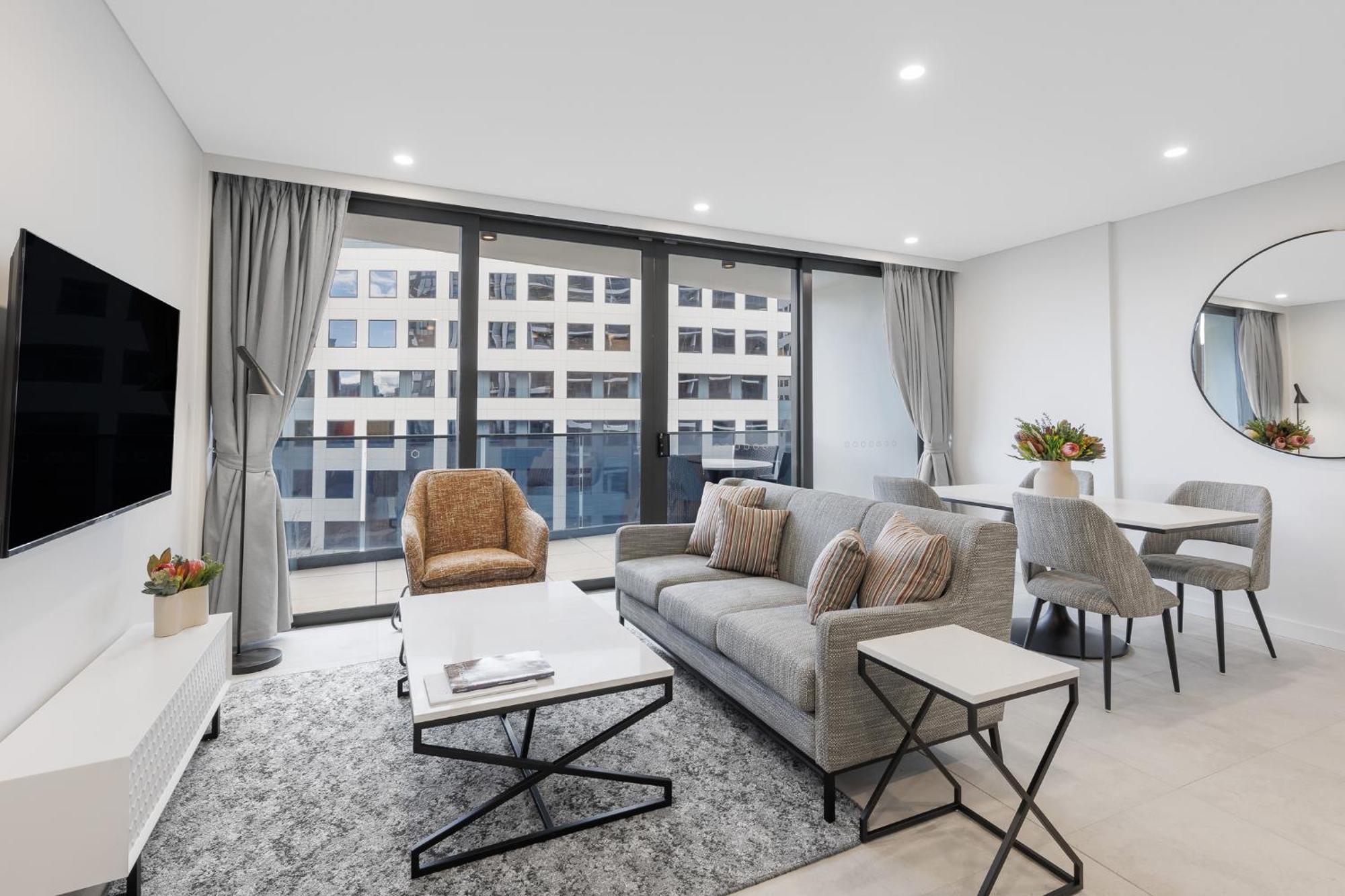 Meriton Suites Canberra Exterior foto Living room
