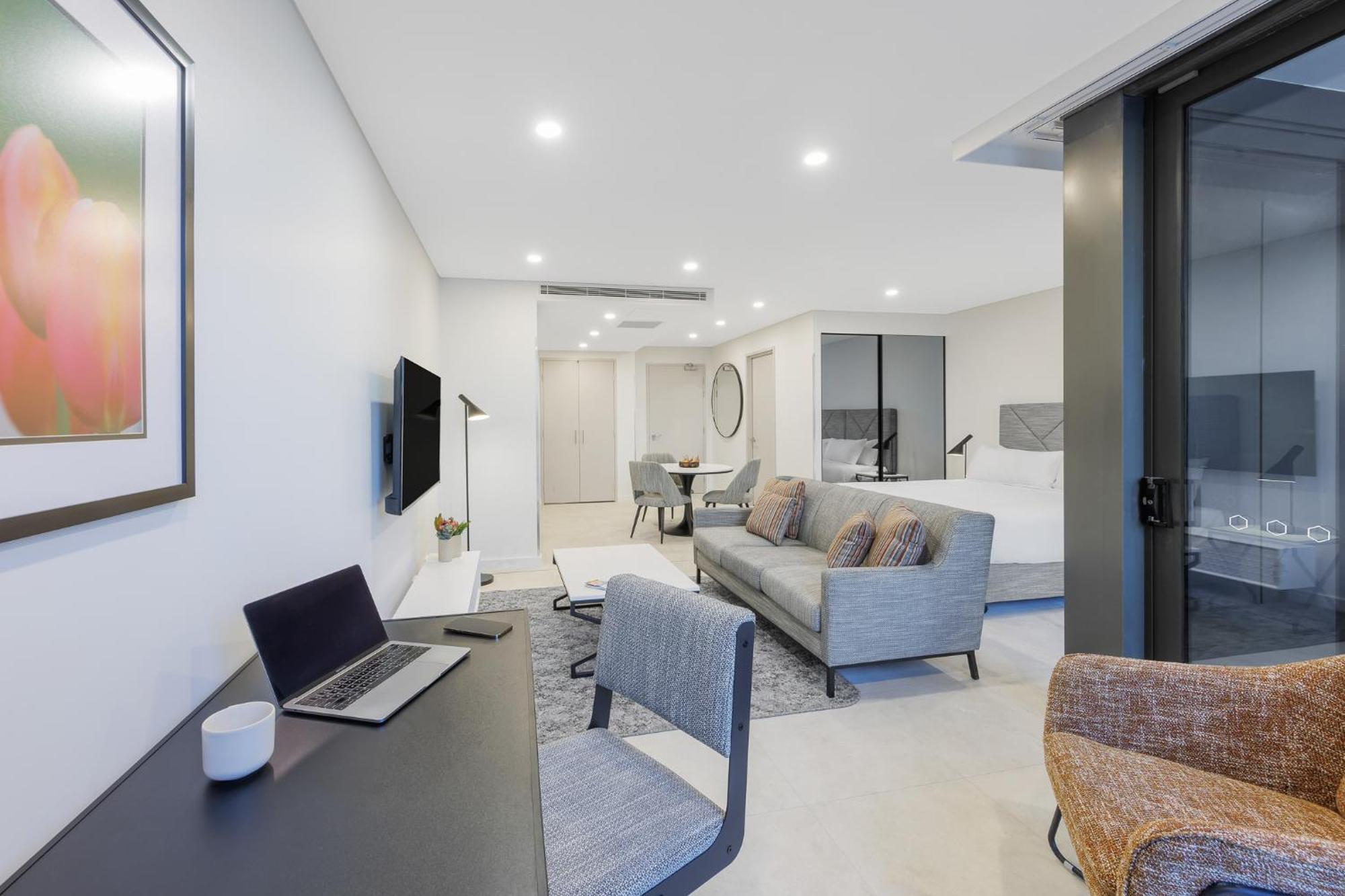 Meriton Suites Canberra Exterior foto A typical apartment interior